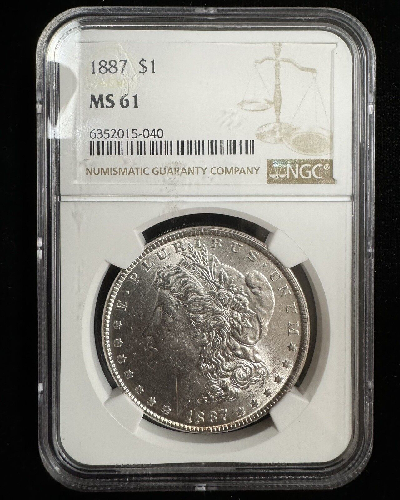 1887 Morgan Dollar NGC - MS61